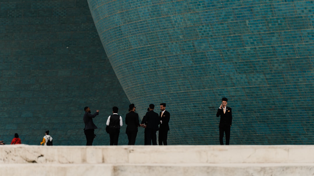 A Modern High End Photorealistic Image Depicting A Diverse Group Of People Analyzing Cryptocurrenc